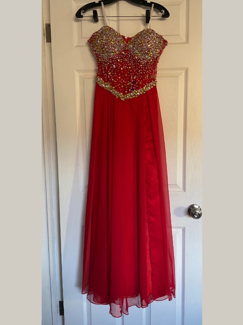 Long red flowy size 8 dress with sequined and rhinestoned bodice